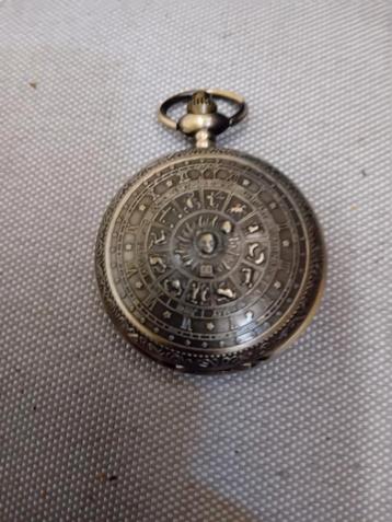 BRONZEN ZAKHORLOGE UITSTEKENDE STAAT EN WERKT VOLLEDIG  beschikbaar voor biedingen