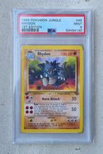 [1st Edition] Rhydon (JU 45) - PSA 9, Hobby en Vrije tijd, Verzamelkaartspellen | Pokémon, Ophalen of Verzenden, Nieuw, Losse kaart