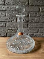 Karaf in kristal, Ophalen