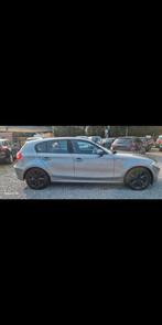 Bmw 118D euro 5  bj 2008 242000 km, Auto's, BMW, Voorwielaandrijving, Euro 5, 1 Reeks, Zwart