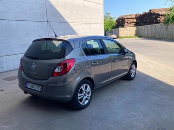 Opel Corsa 1.2 benzine 12/2011 met 83000km*GPS NAVIGATIE*PER, Auto's, Opel, Euro 5, Stof, Zwart, 4 cilinders