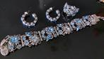 juwelen set Dyrberg Kern lichtblauw, Handtassen en Accessoires, Armbanden, Ophalen of Verzenden, Zo goed als nieuw, Blauw, Met kristal