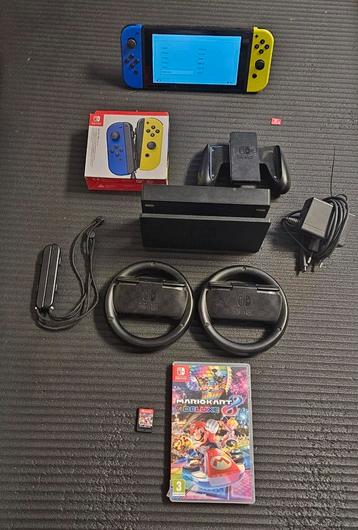 NINTENTO SWITCH PAKKET MET MARIO KART EN STUURTJES!!  beschikbaar voor biedingen
