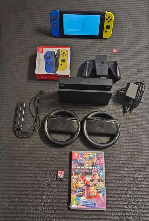NINTENTO SWITCH PAKKET MET MARIO KART EN STUURTJES!!, Games en Spelcomputers, Spelcomputers | Nintendo Switch, Zo goed als nieuw