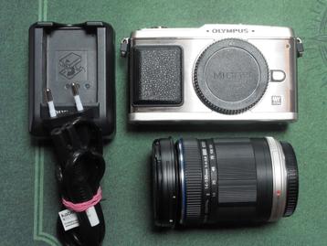 Olympus Pen E-P1 Silver + M.Zuiko 14-150 lens - m43 mft beschikbaar voor biedingen
