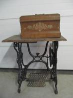 Antieke naaimachine, Ophalen
