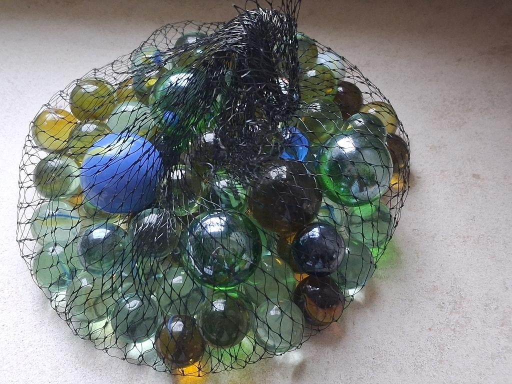 Knikkers  Nieuw, Ophalen