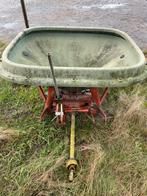 Trioliet strooier., Ophalen