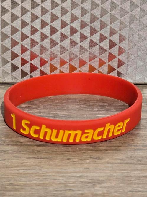 Michael Schumacher Ferrari armband, Handtassen en Accessoires, Armbanden, Nieuw, Kunststof of Plastic, Geel, Ophalen of Verzenden