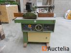 Spinning top met trainer, Ophalen