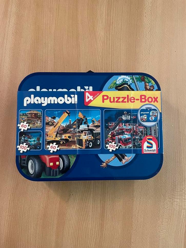 Playmobil puzzle box met 4 puzzels., Kinderen en Baby's, Speelgoed | Kinderpuzzels, Zo goed als nieuw, 6 jaar of ouder, Meer dan 50 stukjes