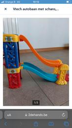 VTech racebaan met schans en 4 voertuigen, Enlèvement, Utilisé, Circuit