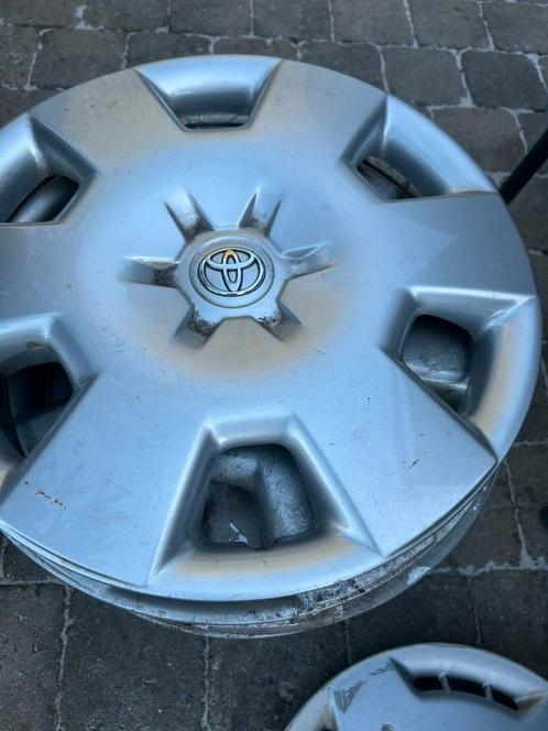 4 wieldoppen Toyota corolla yaris aygo avensis verso 15", Auto diversen, Wieldoppen, Gebruikt, Ophalen of Verzenden