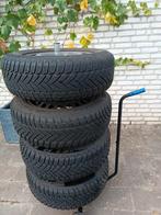 Winterbanden op velg Dunlop maat 195/65 R 15, Ophalen, Zo goed als nieuw