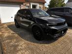 Opel Mokka-e 2023 | Elektrisch | Zwart | Leder | 24.000 km, Auto's, Automaat, 50 kW, Leder, Elektrisch