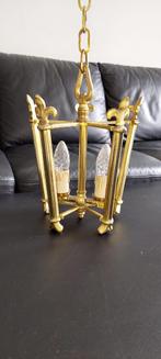 Lustre en laiton, Ophalen