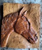 Keramiek paardenhoofd sculptuur, Ophalen