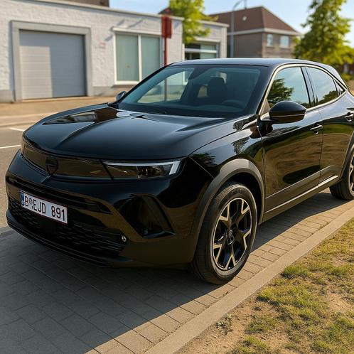Opel Mokka-e 2023 | Elektrisch | Zwart | Leder | 24.000 km, Auto's, Opel, Particulier, Mokka, ABS, Achteruitrijcamera, Adaptieve lichten
