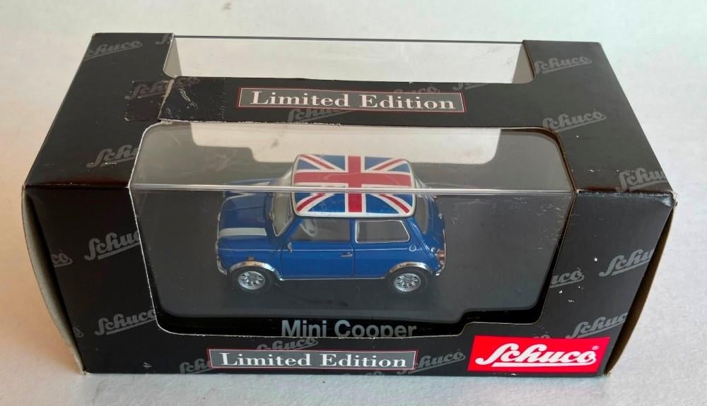 Mini Cooper blauw Union Jack Schuco # 02445., Enlèvement ou Envoi, Comme neuf, Voiture, Schuco
