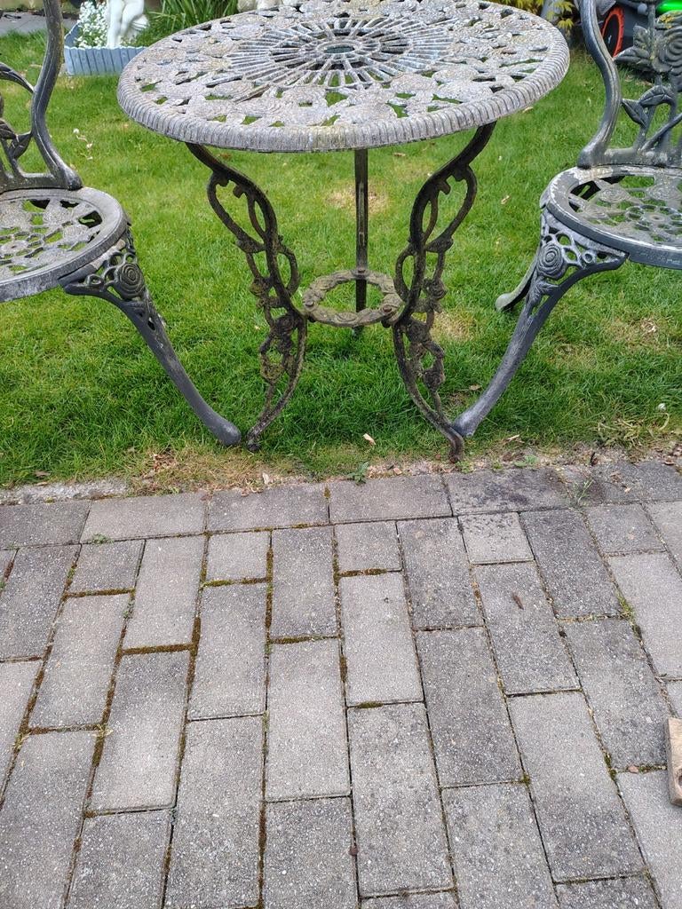 Bistro set in gietijzer, Ophalen