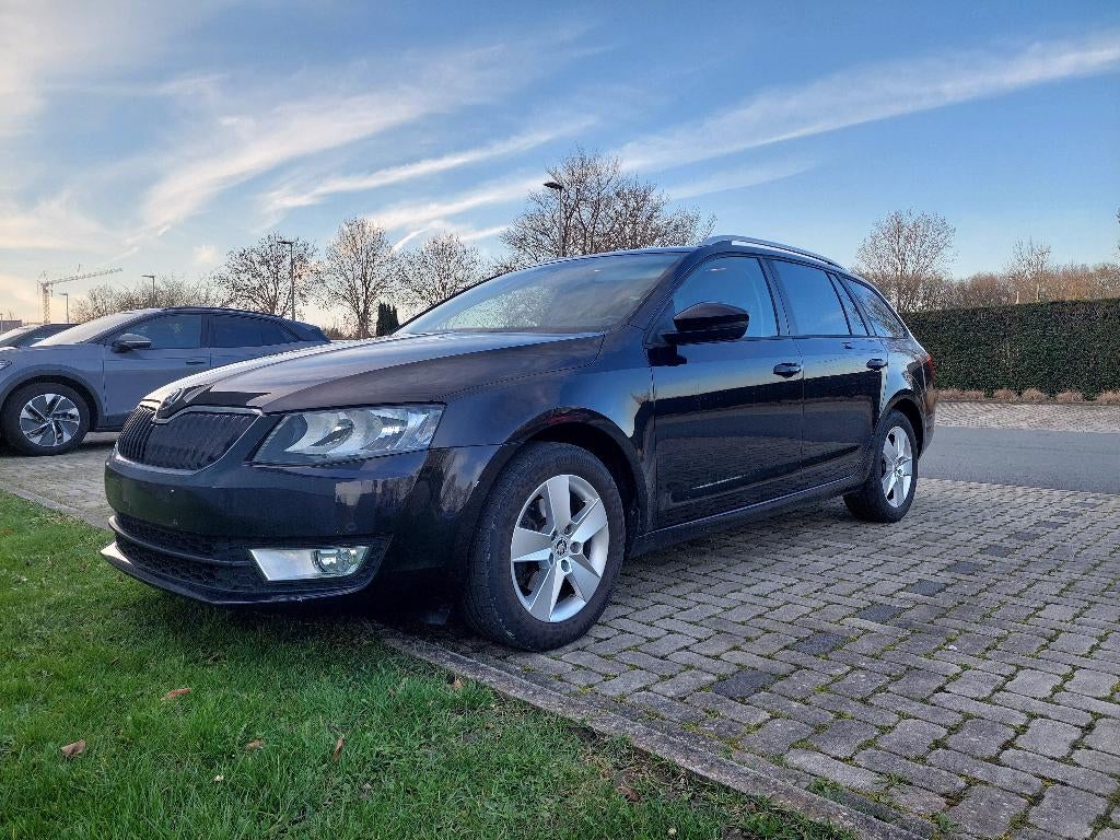 Skoda Octavia Combi Ambition 1.4 benzine 110 kw, Auto's, Stof, Zwart, 5 deurs, Octavia
