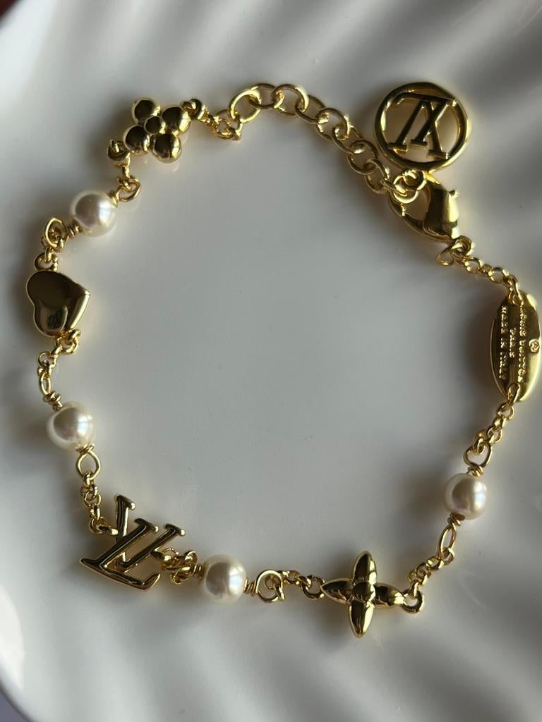 Louis Vuitton heart Armband met Parels, Bijoux, Sacs & Beauté, Bracelets, Enlèvement ou Envoi, Comme neuf, Or, Acier