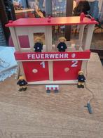 Houten beandweer kazerne met 4 popjes, Ophalen