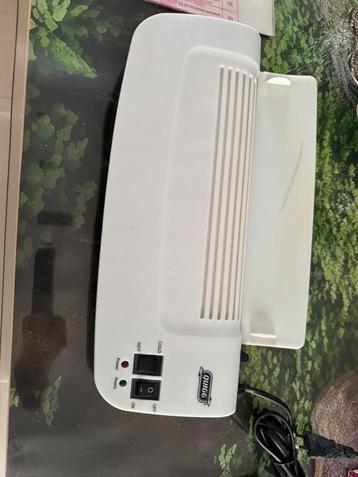 Lamineermachine met folie beschikbaar voor biedingen