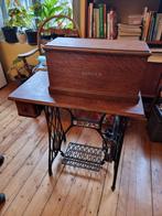 Singer antieke naaimachine, Ophalen