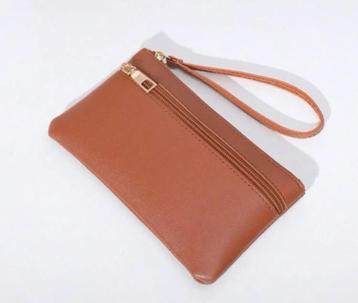 Telefoonportemonnee met rits, 18 x 11 cm nieuw in verpakking beschikbaar voor biedingen