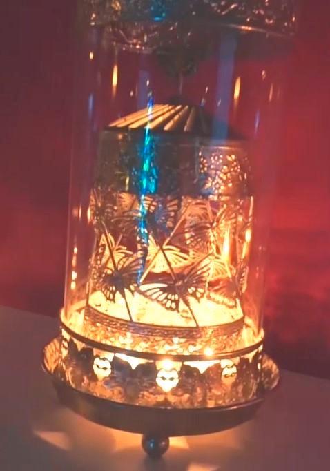 windlicht draaiend op warmte theelichtjes, Huis en Inrichting, Woonaccessoires | Kandelaars en Kaarsen, Metaal, Ophalen