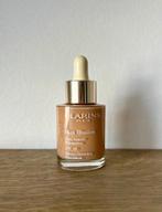 Clarins skin foundation fond de teint kleur 112 amber 30 ml, Handtassen en Accessoires, Gehele gezicht, Beige, Nieuw, Ophalen of Verzenden