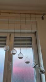 Hanging glass globes, Ophalen