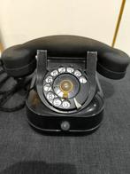 Belgische draaitelefoon, Ophalen