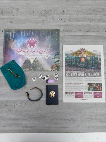 Tomorrowland 2013 - bracelet, krant, jetons, poster... beschikbaar voor biedingen