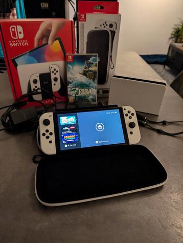 Nintendo Switch OLED comme neuve, boîte complète + Jeu Zelda beschikbaar voor biedingen