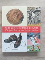 Boek Rode Duivels & Oranje Leeuwen, Boeken, Ophalen of Verzenden, Zo goed als nieuw, Balsport