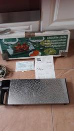 Plaque pour chauffer les plats  neuf