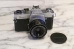 Topcon Unirex met UV Topcor 50mm/ f2.8 en tas, Ophalen of Verzenden, 1980 tot heden, Fototoestel