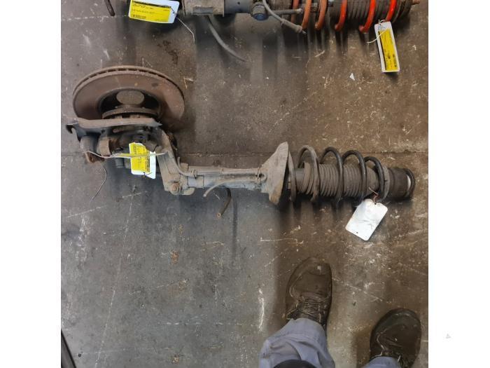 Schokdemperpoot links-voor van een Volkswagen Golf, Auto-onderdelen, Ophanging en Onderstel, Volkswagen, Gebruikt, 3 maanden garantie