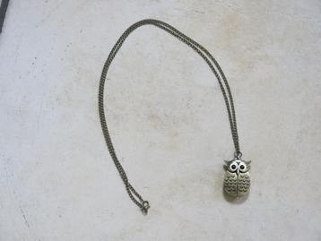 Een halsketting uil horloge beschikbaar voor biedingen