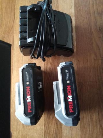2 batterijen met lader  beschikbaar voor biedingen