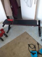 Banc de musculation et des haltères