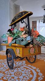 Oude miniatuur bakfiets, Ophalen