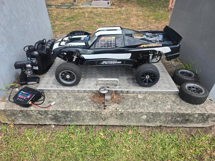 King motor T1000 1:5 benzine 2 takt bestuurbare auto € 500, Kinderen en Baby's, Speelgoed |Speelgoedvoertuigen, Ophalen