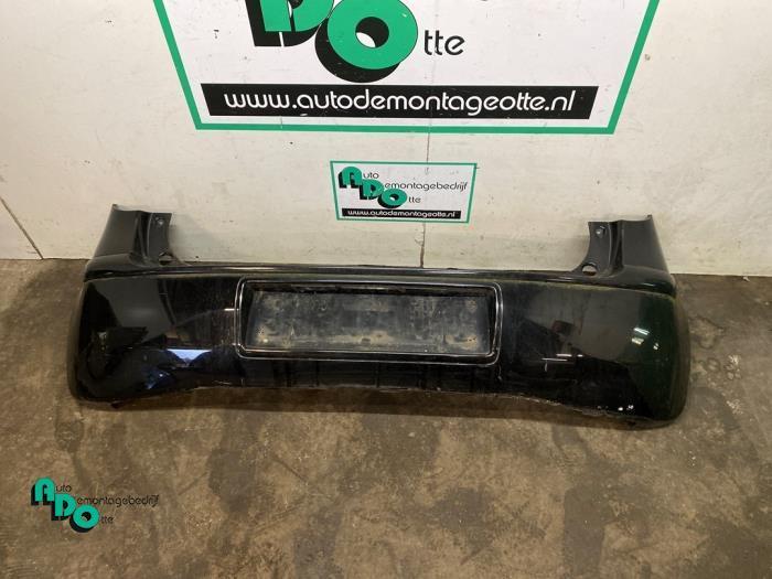 Achterbumper van een Mitsubishi Colt (Colt 04-) (08H), Auto-onderdelen, Carrosserie, Bumper, Mitsubishi, Gebruikt, 3 maanden garantie