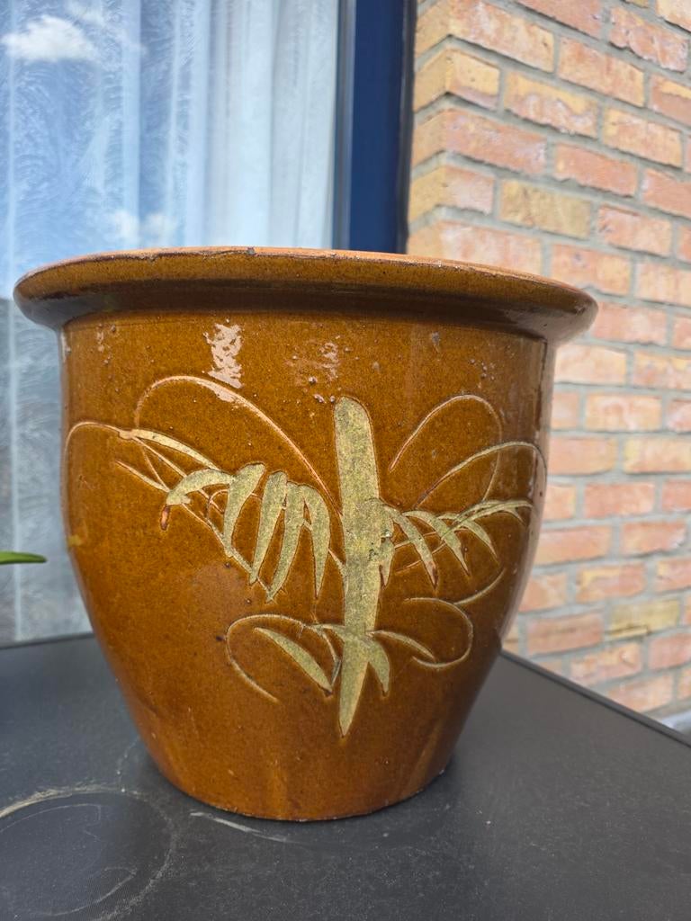 Stenen bloempot, Ophalen