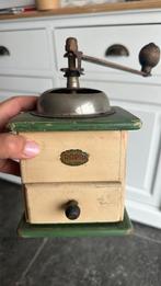 Oude koffiemolen, Ophalen