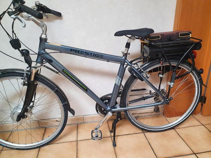 Goed onderhouden elektriche fiets maat 61 in heel nieuwstaat, Fietsen en Brommers, Elektrische fietsen, Ophalen of Verzenden