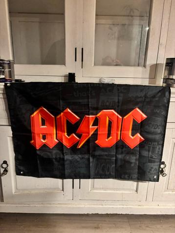 AC/DC vlag - krantenknipsels beschikbaar voor biedingen